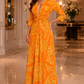 Golden Sunset Twist Maxi Dress