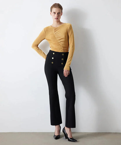 Trousers with metal buttons