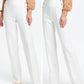 White pants with gold slim-bottoms